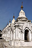 Myanmar - Mandalay, Kuthodaw Pagoda. 729 white pitaka pagodas contain the Tipitaka, the sacred texts of Theravada Buddhism. 